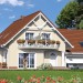 Проект двухэтажного дома с двухместным гаражом 17 на 11
