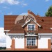 Проект двухэтажного дома с одноместным гаражом 16 на 10