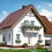 Проект двухэтажного дома из силикатного кирпича с одноместным гаражом - NA-10