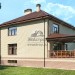 Проект двухэтажного дома в европейском стиле с цокольным этажом и двухместным гаражом