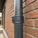 Водосток Grand Line 125x90  -  Хомут трубы (на кирпич) RAL 7024