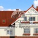 Проект узкого жилого дома в европейском стиле из газобетона с мансардным этажом и двухместным гаражом с площадью до 300 кв м